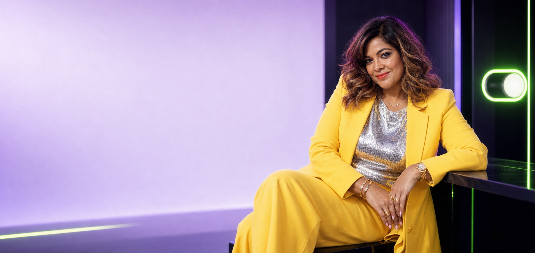 Nishma in a bold yellow suit for the Switched ON campaign